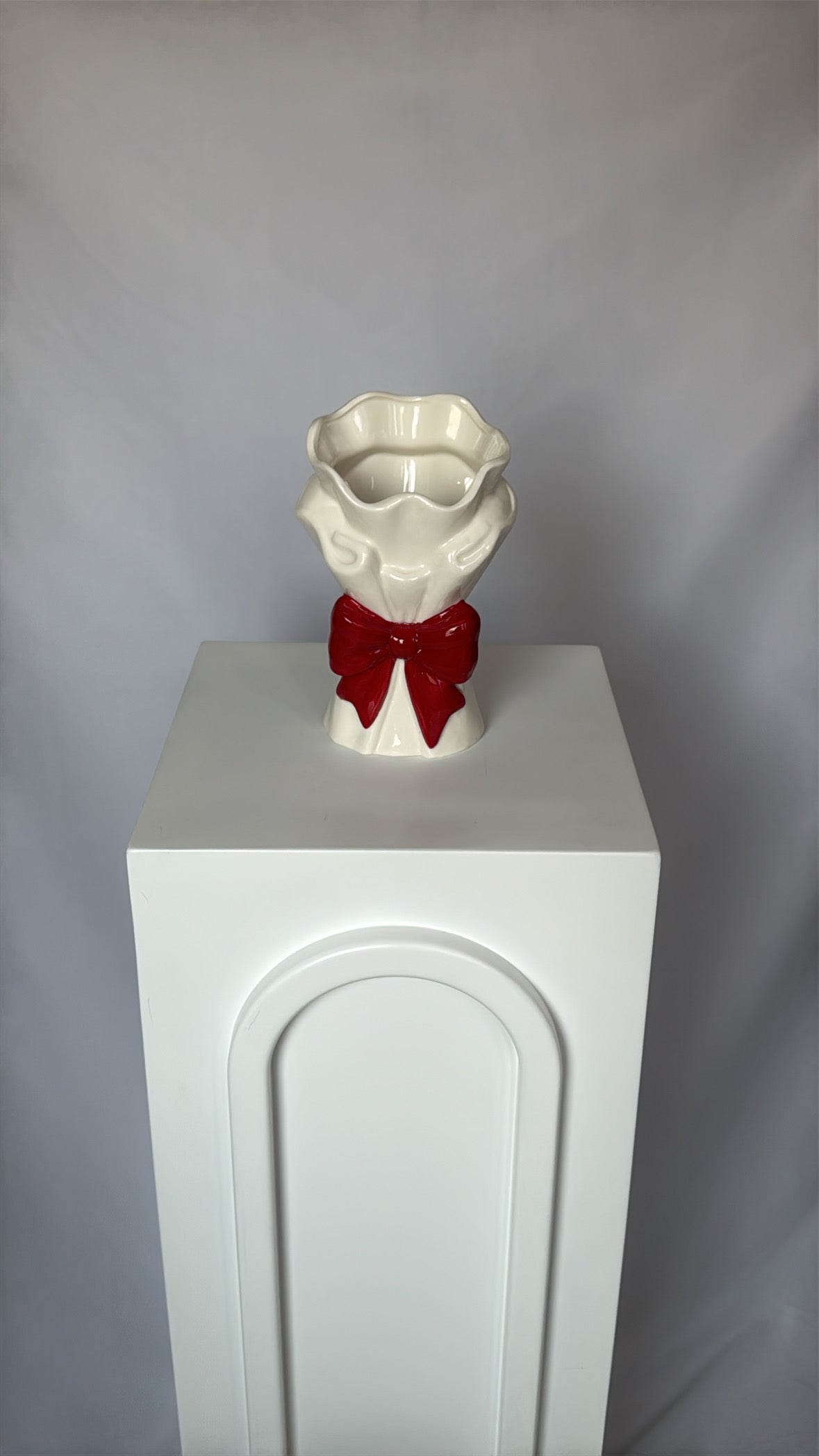 red bow vase